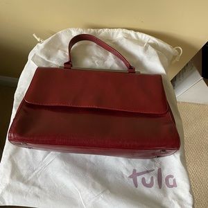Red glossy bag